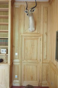 Boiseries hautes et bibliothèques pour un château