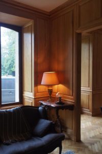 Boiseries hautes et bibliothèques pour un château