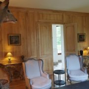 Boiseries hautes et bibliothèques pour un château