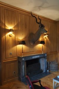 Boiseries hautes et bibliothèques pour un château